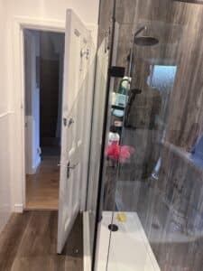 Wall panels walk in showerscreen and new black mixer shower