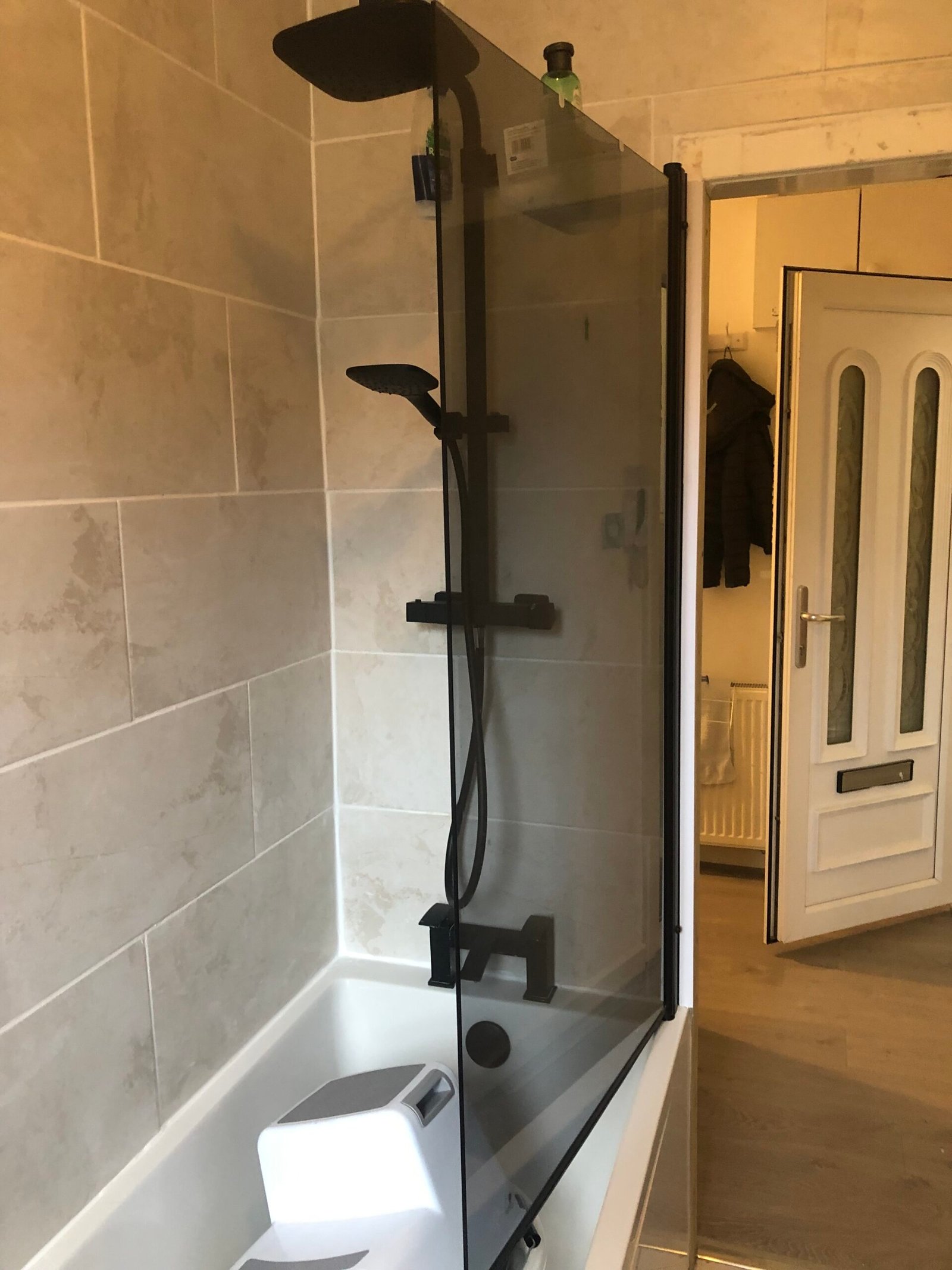 black mixer shower and screen installed