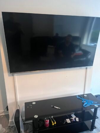 TV wall mounted with cable trunking in Drumchapel living room