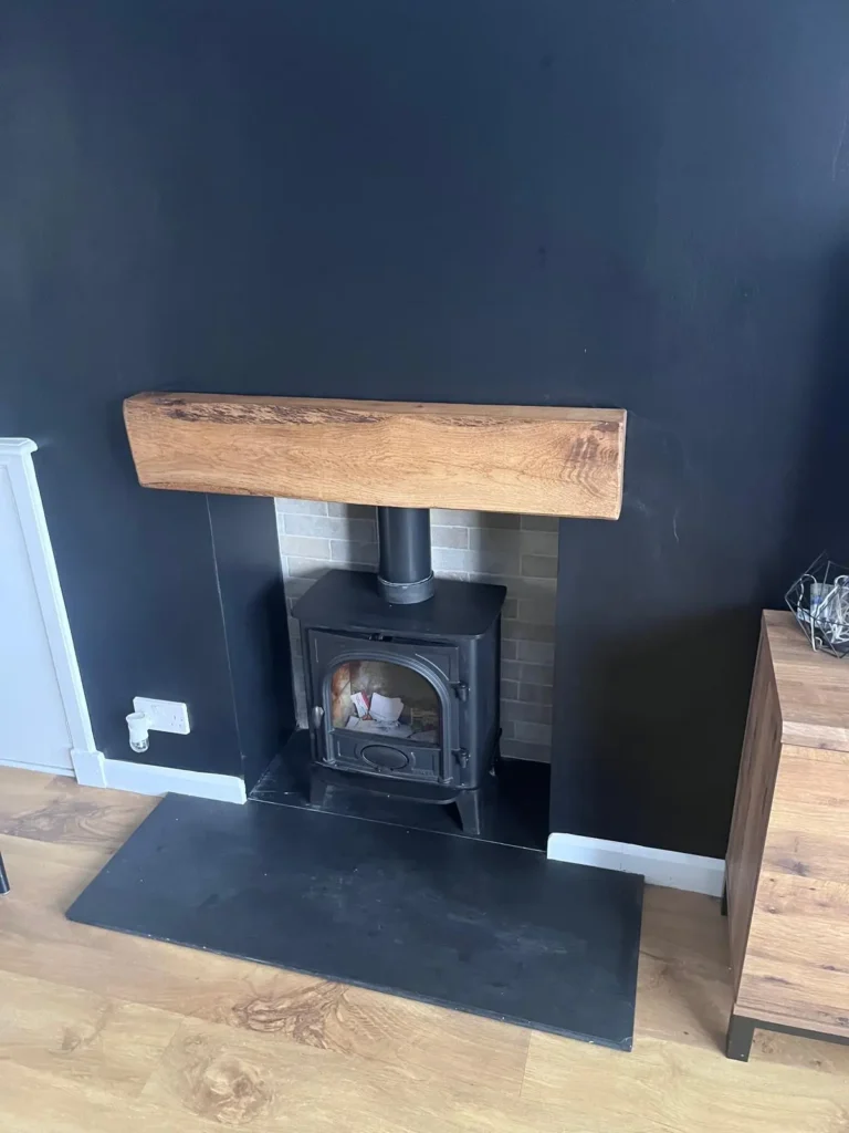 wooden log above fire