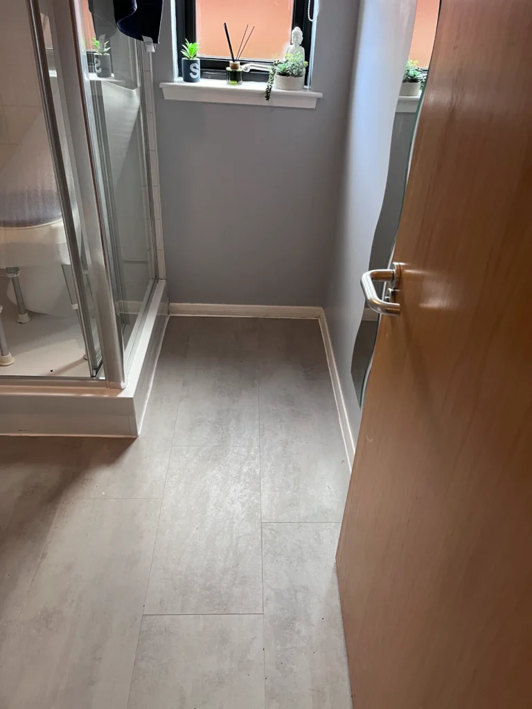 vynl flooring fitted in small bathroom