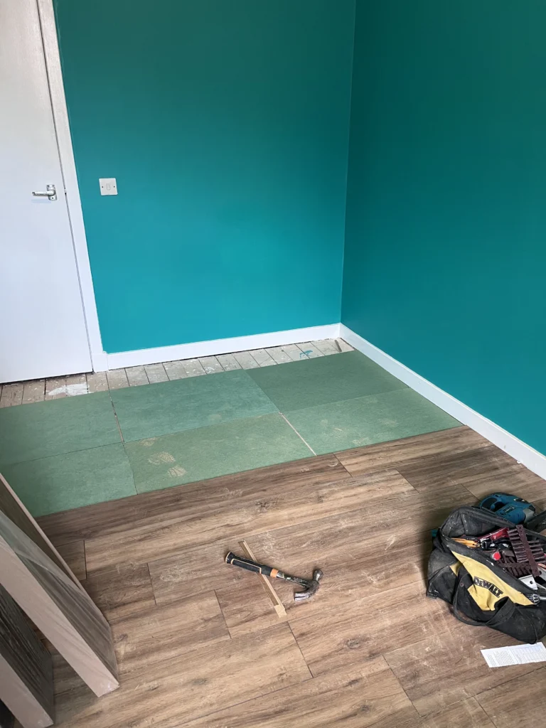 Laminate flooring fitted in bedroom